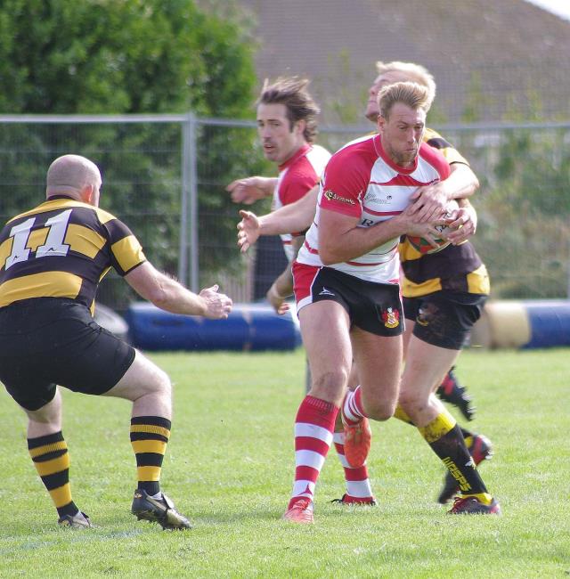 Josh Thomas takes the ball on the burst, the Mariners winger crossed for two tries